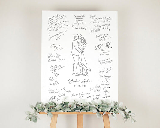 Wedding guest book line art on a easel