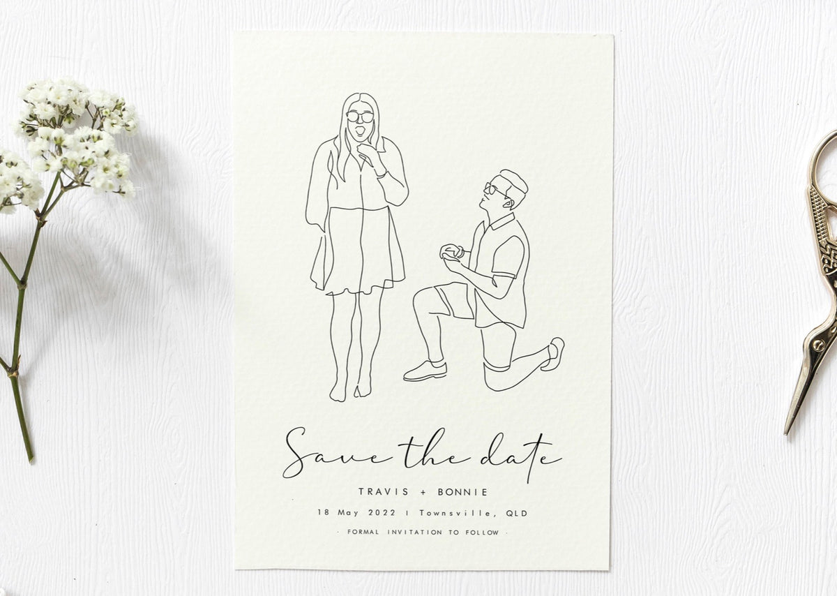 A off-white save the date card with a line art portrait of a couple. The man is one one knee proposing to her and she looks surprised